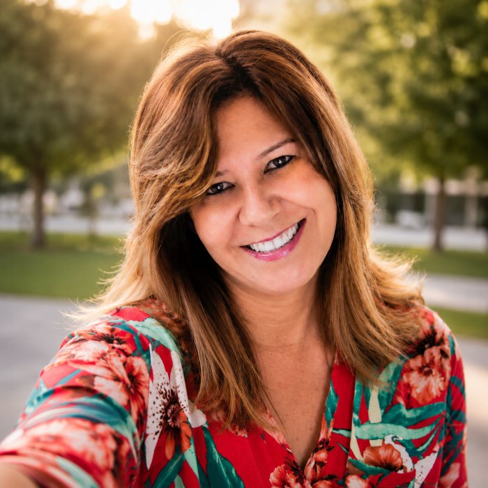 Joana, anfitriã e fundadora